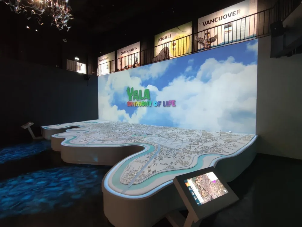 Projection and touch display around a model of Yala city
